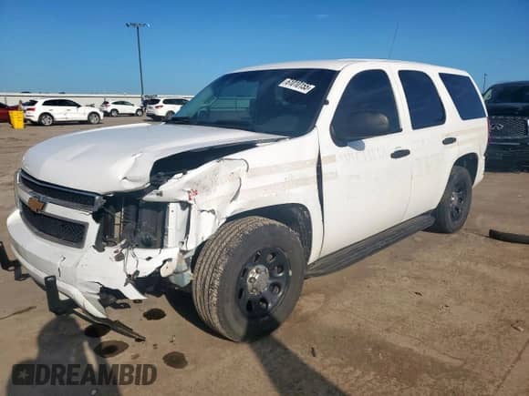 2014 Chevrolet Tahoe Commercial с VIN 1GNLC2E04ER184782, выставлен на аукционе Copart как лот 61010155 с пробегом 156 768 миль миль и Списание • Salvage title. История ставок и продаж доступна на DreamBid. Изображение 1.