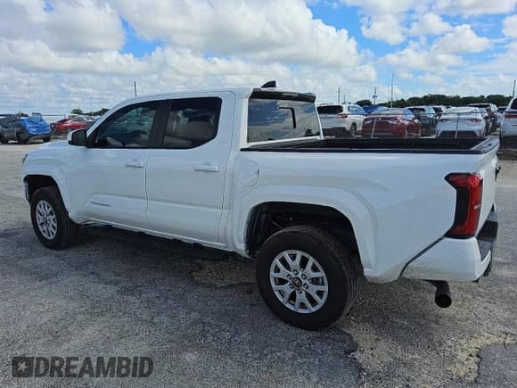 2024 Toyota Tacoma SR5 with VIN 3TYKB5FNXRT009175, listed as a Copart auction lot 84457005 with 3,960 mi miles and Clean title. Bid and sale history available at DreamBid. Image 2.