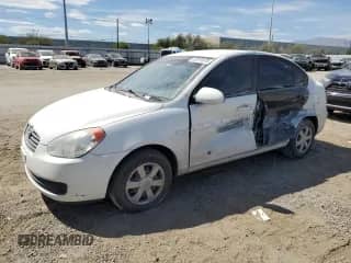 2006 Hyundai Accent GLS z VIN KMHCN46C86U058555, wystawiony jako Copart lot #69791675 z przebiegiem 73 404 mil mil oraz Szkoda całkowita • Salvage title. Historia ofert i sprzedaży dostępna na DreamBid. Obrazek 1.