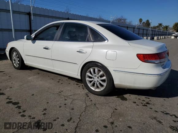 2006 Hyundai Azera SE с VIN KMHFC46F96A086816, выставлен на аукционе Copart как лот 87480804 с пробегом 216 995 миль миль и Чистый • Clean title. История ставок и продаж доступна на DreamBid. Изображение 2.