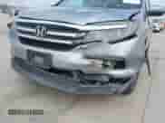 2016 Honda Pilot EX-L z VIN 5FNYF5H84GB005299, wystawiony jako IAAI lot #42314899 z przebiegiem 125 729 mil mil oraz . Historia ofert i sprzedaży dostępna na DreamBid. Obrazek 6.