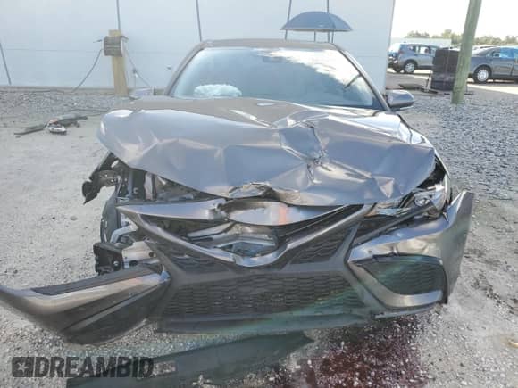 2024 Toyota Camry SE with VIN 4T1G11AK5RU864786, listed as a Copart auction lot 68582355 with 50,946 mi miles and Salvage title. Bid and sale history available at DreamBid. Image 5.