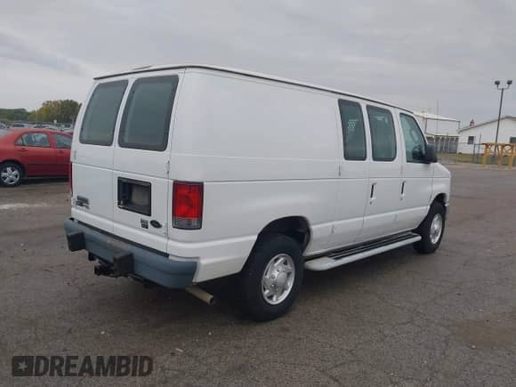 2014 Ford Econoline Cargo Commercial with VIN 1FTNE2EW2EDA19200, listed as a IAAI auction lot 43432200 with 143,691 mi miles and . Bid and sale history available at DreamBid. Image 4.