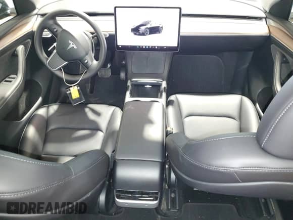 2023 Tesla Model Y Long Range with VIN 7SAYGAEE5PF921301, listed as a Copart auction lot 67586274 with 3,969 mi miles and Salvage title. Bid and sale history available at DreamBid. Image 8.