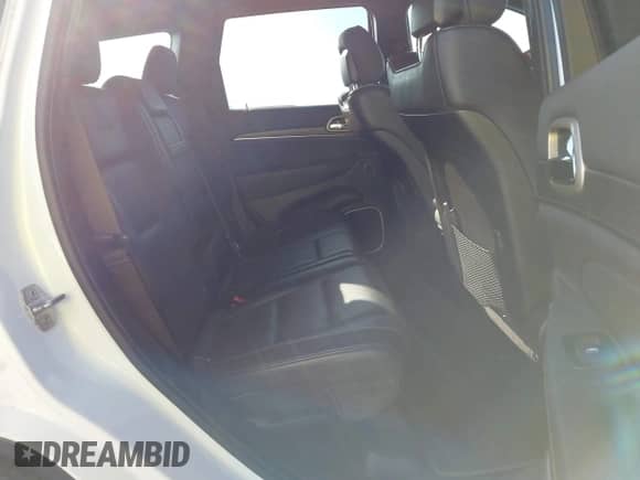 2014 Jeep Grand Cherokee Summit с VIN 1C4RJFJM3EC373015, выставлен на аукционе IAAI как лот 43321112 с пробегом 85 655 миль миль и . История ставок и продаж доступна на DreamBid. Изображение 8.