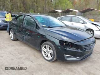 2015 Volvo S60 T5 Drive-E Premier с VIN YV140MFK6F1346875, выставлен на аукционе IAAI как лот 42004365 с пробегом 98 574 миль миль и . История ставок и продаж доступна на DreamBid. Изображение 1.