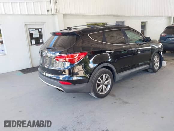 2014 Hyundai Santa Fe с VIN 5XYZU3LA2EG210716, выставлен на аукционе IAAI как лот 43293912 с пробегом 71 779 миль миль и . История ставок и продаж доступна на DreamBid. Изображение 4.