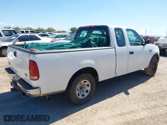 2001 Ford F-150 XL with VIN 2FTPX17Z31CA73099, listed as a IAAI auction lot 43477299 with 160,392 mi miles and . Bid and sale history available at DreamBid. Image 4.