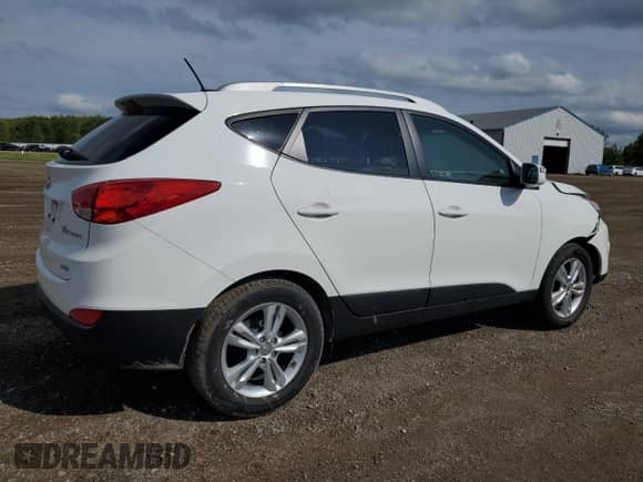 2013 Hyundai Tucson GLS z VIN KM8JUCAC9DU761770, wystawiony jako Copart lot #71138745 z przebiegiem 42 988 mil mil oraz Szkoda całkowita • Salvage title. Historia ofert i sprzedaży dostępna na DreamBid. Obrazek 3.
