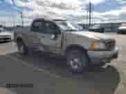 2003 Ford F-150 XLT with VIN 1FTRW08L93KB25558, listed as a Copart auction lot 81910345 with 169,885 mi miles and Salvage title. Bid and sale history available at DreamBid. Image 4.