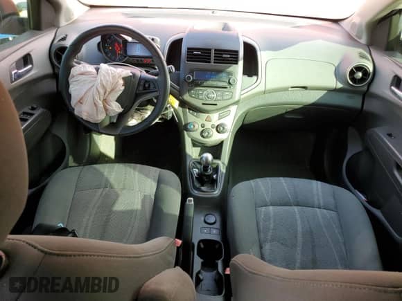 2012 Chevrolet Sonic LT z VIN 1G1JD6SHXC4125785, wystawiony jako Copart lot #89107785 z przebiegiem 118 059 mil mil oraz Szkoda całkowita • Salvage title. Historia ofert i sprzedaży dostępna na DreamBid. Obrazek 8.