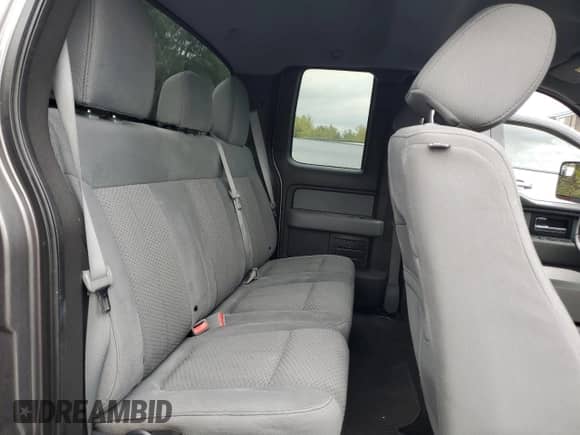 2012 Ford F-150 XL z VIN 1FTFX1EF0CFA32828, wystawiony jako Copart lot #83831125 z przebiegiem 140 814 mil mil oraz Czysty tytuł • Clean title. Historia ofert i sprzedaży dostępna na DreamBid. Obrazek 10.