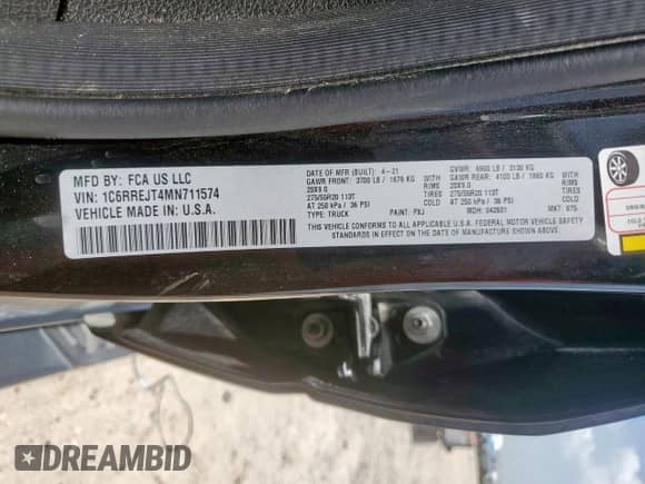 2021 Ram 1500 Laramie z VIN 1C6RREJT4MN711574, wystawiony jako Copart lot #61035445 z przebiegiem 99 486 mil mil oraz Szkoda całkowita • Salvage title. Historia ofert i sprzedaży dostępna na DreamBid. Obrazek 13.