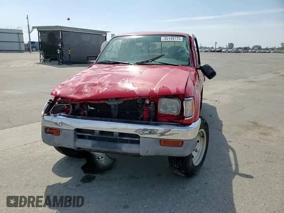 1997 Toyota Tacoma z VIN 4TAWN72N2VZ264266, wystawiony jako Copart lot #55149775 z przebiegiem 245 769 mil mil oraz Szkoda całkowita • Salvage title. Historia ofert i sprzedaży dostępna na DreamBid. Obrazek 14.