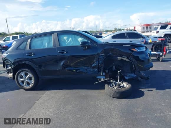 2025 Honda HR-V LX with VIN 3CZRZ1H38SM711151, listed as a IAAI auction lot 42902721 with 54,502 mi miles and . Bid and sale history available at DreamBid. Image 14.