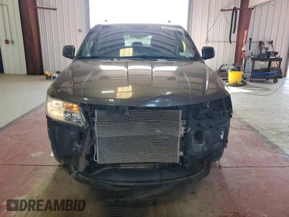 2015 Dodge Journey SXT with VIN 3C4PDDBG0FT651497, listed as a Copart auction lot 71617105 with 92,765 mi miles and Salvage title. Bid and sale history available at DreamBid. Image 5.