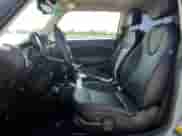 2011 MINI Hardtop with VIN WMWSU3C52BT096248, listed as a Copart auction lot 62008285 with 129,794 mi miles and Salvage title. Bid and sale history available at DreamBid. Image 7.