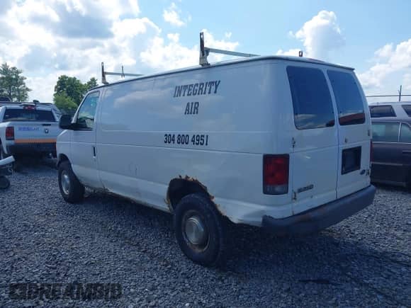 2006 Ford Econoline Cargo with VIN 1FTNE24W66DB06861, listed as a IAAI auction lot 42601070 with 295,531 mi miles and . Bid and sale history available at DreamBid. Image 3.