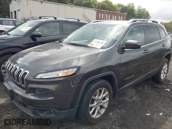 2014 Jeep Cherokee Latitude with VIN 1C4PJMCS5EW200506, listed as a IAAI auction lot 43158630 with 148,814 mi miles and . Bid and sale history available at DreamBid. Image 2.