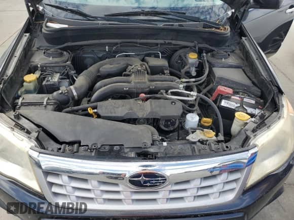 2012 Subaru Forester X Limited z VIN JF2SHAEC1CH469454, wystawiony jako Copart lot #84273595 z przebiegiem 155 862 mil mil oraz Szkoda całkowita • Salvage title. Historia ofert i sprzedaży dostępna na DreamBid. Obrazek 12.