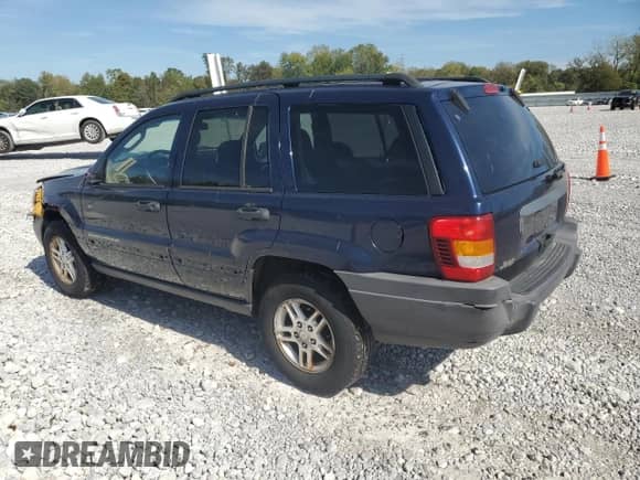 2004 Jeep Grand Cherokee Laredo with VIN 1J4GX48S14C220124, listed as a Copart auction lot 84979245 with 237,797 mi miles and Salvage title. Bid and sale history available at DreamBid. Image 2.