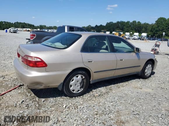 2000 Honda Accord LX с VIN 1HGCG5648YA044898, выставлен на аукционе Copart как лот 70706415 с пробегом 151 386 миль миль и Списание • Salvage title. История ставок и продаж доступна на DreamBid. Изображение 3.