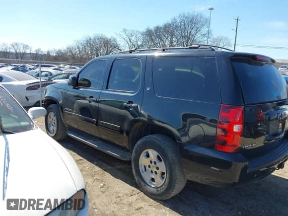 2012 Chevrolet Tahoe LT with VIN 1GNSCBE01CR320553, listed as a IAAI auction lot 41643363 with 270,271 mi miles and . Bid and sale history available at DreamBid. Image 14.