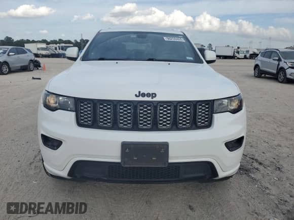 2018 Jeep Grand Cherokee Laredo z VIN 1C4RJFAG9JC303121, wystawiony jako Copart lot #90259455 z przebiegiem 125 299 mil mil oraz Czysty tytuł • Clean title. Historia ofert i sprzedaży dostępna na DreamBid. Obrazek 5.