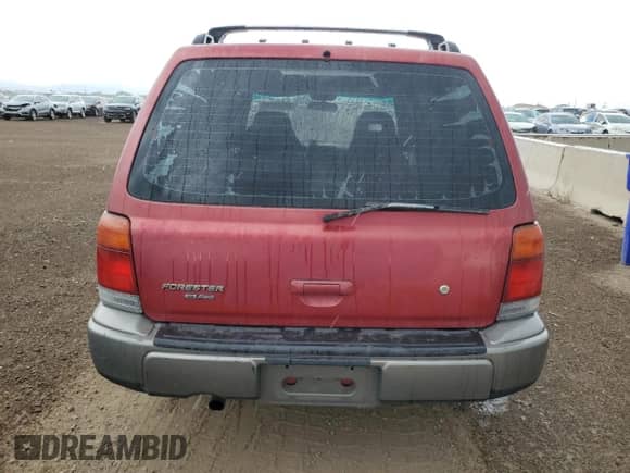 1998 Subaru Forester S with VIN JF1SF6557WH755368, listed as a Copart auction lot 80395265 with 287,242 mi miles and Salvage title. Bid and sale history available at DreamBid. Image 6.