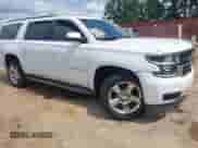2015 Chevrolet Suburban LT z VIN 1GNSCJKC4FR298108, wystawiony jako IAAI lot #42649373 z przebiegiem 150 155 mil mil oraz . Historia ofert i sprzedaży dostępna na DreamBid. Obrazek 1.