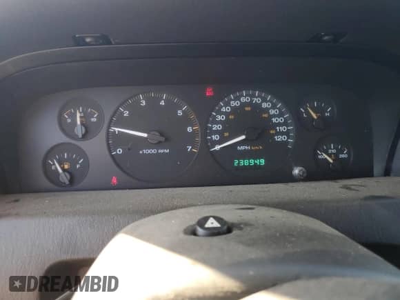 2002 Jeep Grand Cherokee Laredo with VIN 1J4GX48S92C313728, listed as a Copart auction lot 83966235 with 238,949 mi miles and Clean title. Bid and sale history available at DreamBid. Image 9.