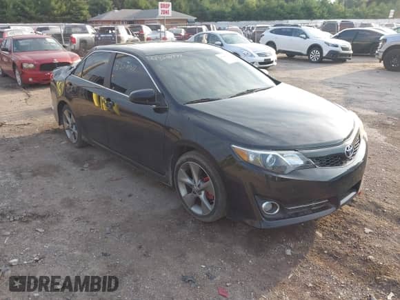 2014 Toyota Camry SE with VIN 4T1BF1FK1EU820993, listed as a IAAI auction lot 43000977 with 194,953 mi miles and . Bid and sale history available at DreamBid. Image 1.