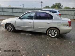 2005 Hyundai Elantra GLS z VIN KMHDN46D55U927656, wystawiony jako Copart lot #89898875 z przebiegiem 202 757 mil mil oraz Szkoda całkowita • Salvage title. Historia ofert i sprzedaży dostępna na DreamBid. Obrazek 2.