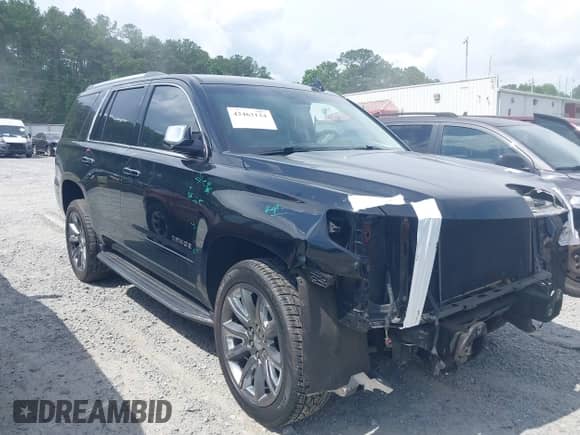 2017 Chevrolet Tahoe Premier with VIN 1GNSCCKC5HR390553, listed as a IAAI auction lot 42463124 with 123,000 mi miles and . Bid and sale history available at DreamBid. Image 13.
