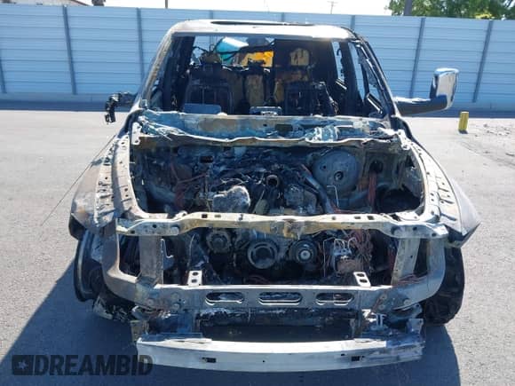 2014 Ram 1500 Longhorn z VIN 1C6RR7PM1ES393539, wystawiony jako IAAI lot #42370232 z przebiegiem Nie podano mil oraz . Historia ofert i sprzedaży dostępna na DreamBid. Obrazek 6.