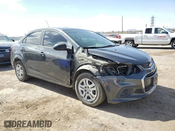 2019 Chevrolet Sonic LS с VIN 1G1JB5SB4K4102934, выставлен на аукционе Copart как лот 47423525 с пробегом 71 199 миль миль и Списание • Salvage title. История ставок и продаж доступна на DreamBid. Изображение 4.