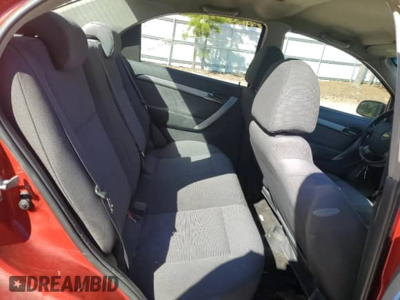 2011 Chevrolet Aveo 1LT z VIN KL1TD5DE1BB128315, wystawiony jako Copart lot #76627844 z przebiegiem 182 972 mil mil oraz Czysty tytuł • Clean title. Historia ofert i sprzedaży dostępna na DreamBid. Obrazek 10.