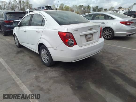 2012 Chevrolet Sonic LS with VIN 1G1JB5SH8C4215968, listed as a IAAI auction lot 41922525 with 206,643 mi miles and . Bid and sale history available at DreamBid. Image 3.