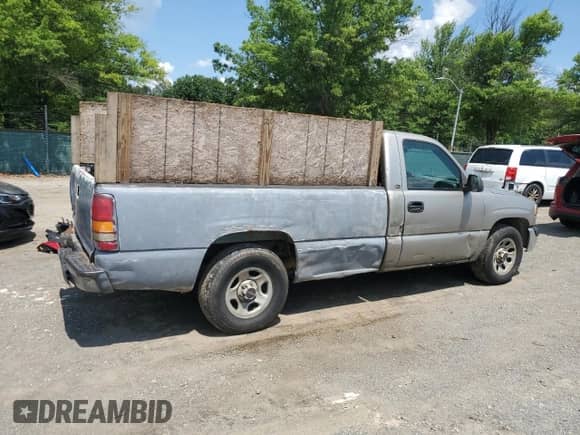 2001 GMC Sierra 1500 SL with VIN 1GTEC14W21Z187496, listed as a Copart auction lot 63243275 with 251,682 mi miles and Salvage title. Bid and sale history available at DreamBid. Image 3.