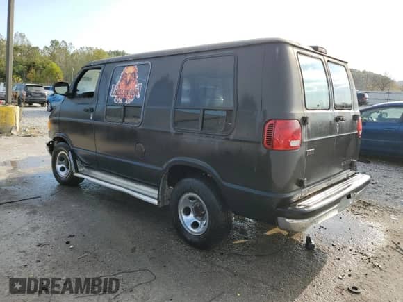 1999 Dodge Cargo Conversion with VIN 2B6HB11Y2XK573535, listed as a Copart auction lot 86497215 with 114,338 mi miles and Salvage title. Bid and sale history available at DreamBid. Image 2.