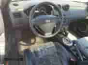 2003 Hyundai Tiburon GT с VIN KMHHN65F53U041351, выставлен на аукционе Copart как лот 52332395 с пробегом 194 821 миль миль и Чистый • Clean title. История ставок и продаж доступна на DreamBid. Изображение 8.