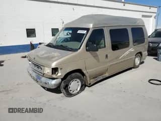 2000 Ford Econoline Cargo Recreational with VIN 1FDRE14LXYHA20588, listed as a Copart auction lot 69209465 with 119,598 mi miles and Salvage title. Bid and sale history available at DreamBid. Image 1.