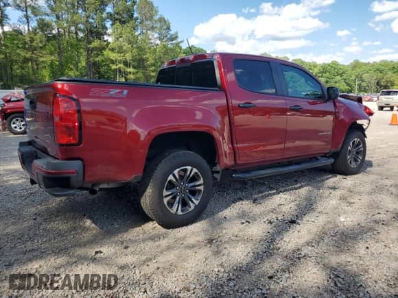 2021 Chevrolet Colorado 4WD Z71 with VIN 1GCGTDEN2M1101395, listed as a Copart auction lot 54913585 with 69,706 mi miles and Salvage title. Bid and sale history available at DreamBid. Image 3.