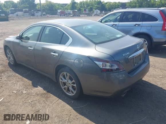 2014 Nissan Maxima SV z VIN 1N4AA5AP7EC906006, wystawiony jako IAAI lot #42411784 z przebiegiem 192 504 mil mil oraz . Historia ofert i sprzedaży dostępna na DreamBid. Obrazek 3.