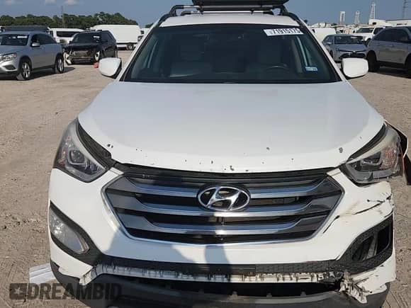 2013 Hyundai Santa Fe Sport z VIN 5XYZU3LB6DG123389, wystawiony jako Copart lot #71915175 z przebiegiem 86 712 mil mil oraz Szkoda całkowita • Salvage title. Historia ofert i sprzedaży dostępna na DreamBid. Obrazek 14.