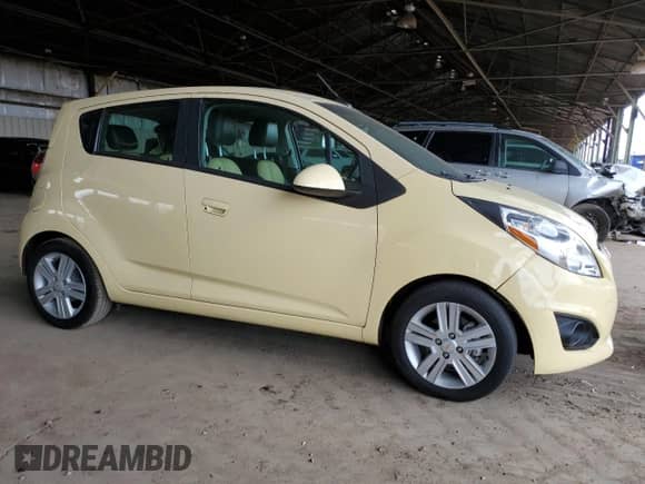2014 Chevrolet Spark LS with VIN KL8CB6S94EC569437, listed as a Copart auction lot 49006795 with 54,581 mi miles and Clean title. Bid and sale history available at DreamBid. Image 4.