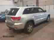 2011 Jeep Grand Cherokee 70th Anniversary with VIN 1J4RR4GG5BC571955, listed as a IAAI auction lot 42142924 with 251,814 mi miles and . Bid and sale history available at DreamBid. Image 4.