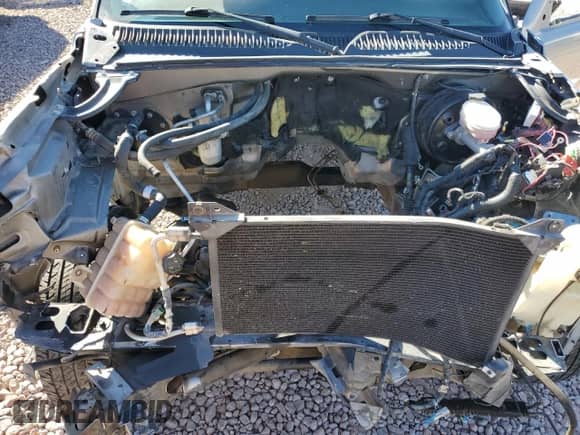 2006 Chevrolet Silverado 1500 LS z VIN 1GCEC19X26Z239427, wystawiony jako Copart lot #79347794 z przebiegiem Nie podano mil oraz Czysty tytuł • Clean title. Historia ofert i sprzedaży dostępna na DreamBid. Obrazek 11.