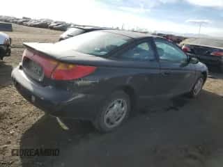 2002 Saturn SC с VIN 1G8ZY14702Z107166, выставлен на аукционе Copart как лот 87435474 с пробегом 178 319 миль миль и Списание • Salvage title. История ставок и продаж доступна на DreamBid. Изображение 3.
