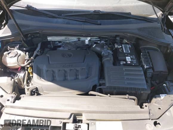 2022 Volkswagen Tiguan SE with VIN 3VV2B7AX3NM132957, listed as a IAAI auction lot 43105559 with 62,359 mi miles and . Bid and sale history available at DreamBid. Image 10.